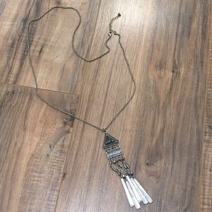 Long tribal necklace.